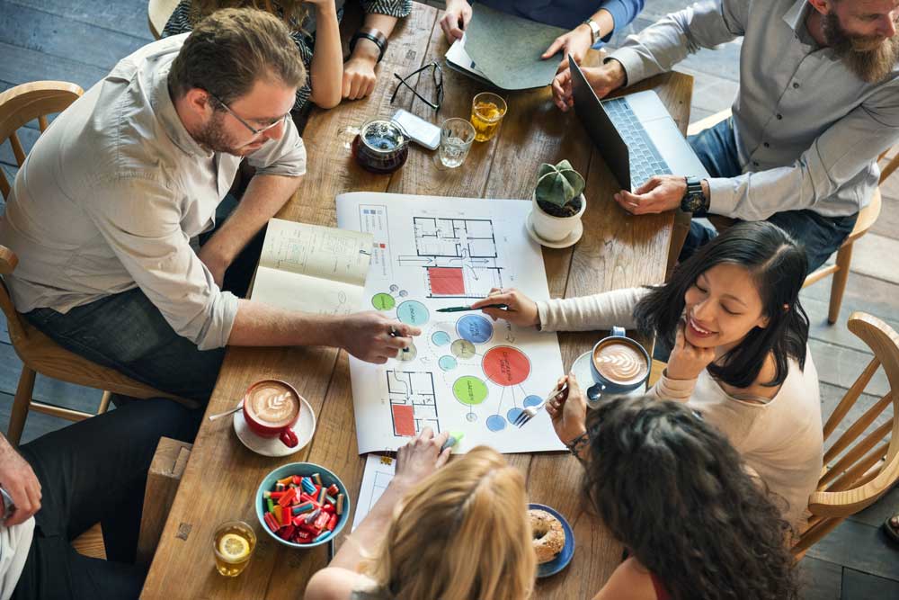 people-sitting-at-coworking-meeting